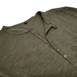 Close-up of olive green slub cotton Henley shirt showing neckline and buttons