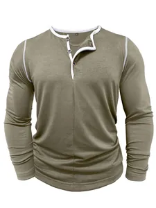 Close-up of olive green men's Henley shirt featuring white contrast trim and button neckline.