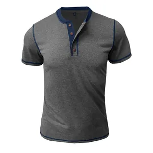 Detail view of grey Henley collar with navy contrast stitching and decorative wood-style buttons.