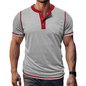 Detailed view of men's grey casual Henley T-shirt featuring red contrast trim and pocket