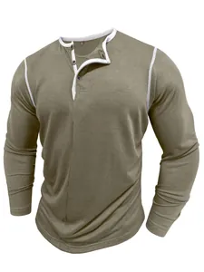 Detail view of khaki long sleeve Henley shirt with white contrast trim and buttons
