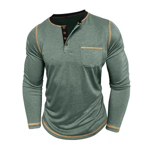 Detailed view of sage green men's long-sleeve Henley shirt with contrast stitching and pocket
