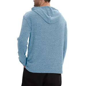 Detailed back view of men's blue ribbed long sleeve hoodie showing fine knit texture