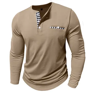 Detail of men's long-sleeve Henley shirt with plaid contrast trim and white buttons.