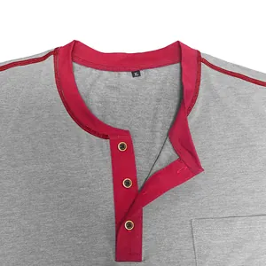 Detail view of burgundy contrast Henley collar with three buttons on grey knit T-shirt