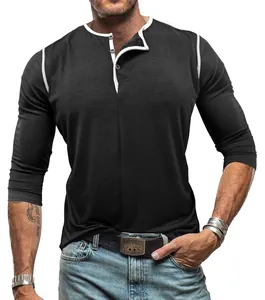 Detailed close-up of men's black long sleeve Henley shirt with white trim decoration