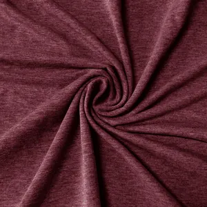 High-resolution macro shot of wine red heathered jersey fabric showing soft texture