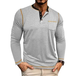Detailed view of grey Henley T-shirt with contrast stitching and chest pocket