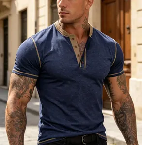 Detailed view of blue slim fit short sleeve Henley shirt with contrast collar trim