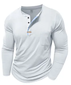 Detailed view of men's white long-sleeved Henley shirt with blue piping detail