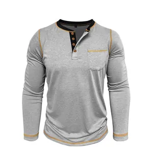 Detail view of men's grey long sleeve Henley t-shirt with 4 buttons and chest pocket