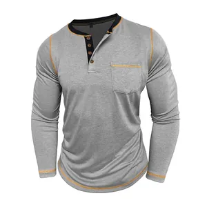 Close-up of grey long-sleeve Henley T-shirt with four buttons and pocket