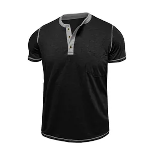 Detail view of men's casual moisture-wicking color-block Henley t-shirt with chest pocket