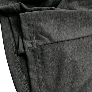 Detail view of the high-quality stitching and charcoal grey fabric on this men's T-shirt.