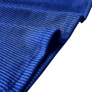 Macro close-up of blue ribbed fabric showing soft texture and premium stitching quality