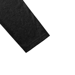 Detailed macro shot of the charcoal grey heather fabric sleeve cuff of a polo shirt