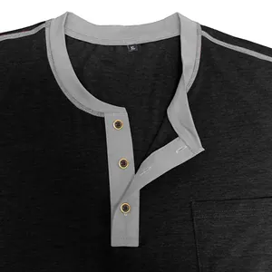 Close-up detail of the Henley neckline and button placket on a men's gray contrast T-shirt.