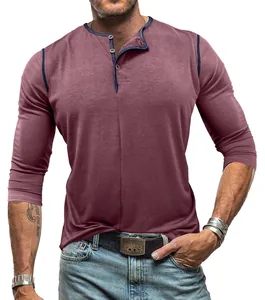 Detail view of maroon men's Henley shirt with navy contrast trim and button collar