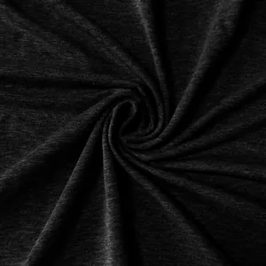 Close-up macro view of high-quality dark grey heathered fabric texture for polo shirts