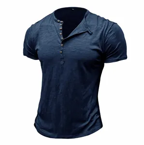 Close-up of navy blue slub cotton Henley t-shirt with buttoned collar detail.