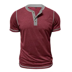 Detailed view of burgundy men's short-sleeved Henley shirt featuring grey contrast trim accents.
