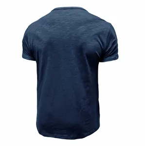 Back view of a navy blue slub cotton short sleeve t-shirt for men with premium texture