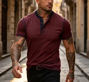 Detail view of a men's burgundy Henley shirt with navy contrast trim on a male model.
