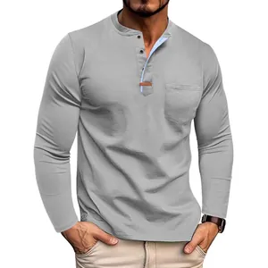 Stylish men's grey long sleeve Henley shirt featuring contrast collar trim and a front pocket