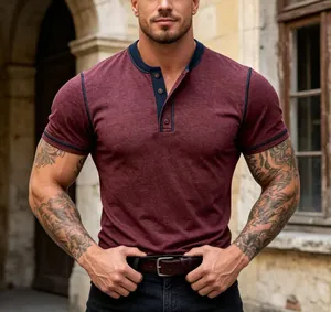 Detailed view of a slim-fit burgundy Henley shirt featuring navy blue contrast trim
