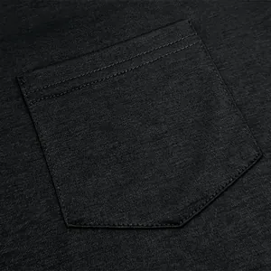 Close-up of the reinforced pocket on a men's black cotton Henley long-sleeved T-shirt.