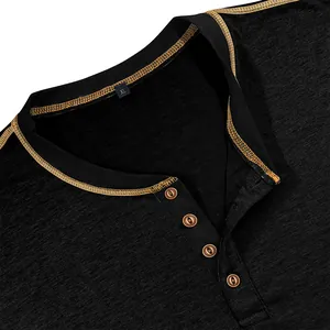 Detail shot of men's Henley shirt collar featuring gold contrast stitching and buttons