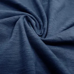 Macro detail view of navy blue breathable slub cotton fabric for men's Henley t-shirt.