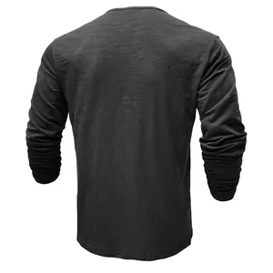 Back view of men's long sleeve slub cotton t-shirt showing charcoal fabric texture