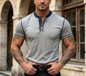 Detailed view of casual men's grey Henley short sleeve T-shirt with navy blue trim