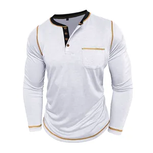 Detail showing the four-button Henley collar and contrast stitching on a white long-sleeve tee.