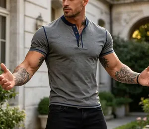 Detailed close-up of a grey slim fit Henley t-shirt featuring elegant navy contrast trim