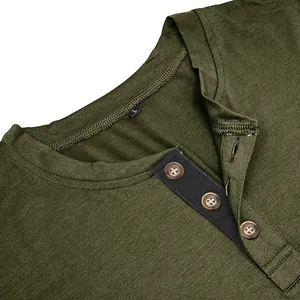 Close-up of olive green men's Henley shirt collar featuring buttons and black placket