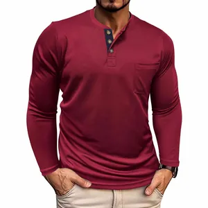 Casual men's burgundy long-sleeved Henley T-shirt featuring a chest pocket and buttons