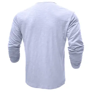 Detailed back view of a men's light blue long sleeve slub cotton Henley casual shirt