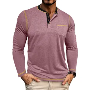 Detail view of men's quick-dry Henley shirt with four-button collar and gold stitching