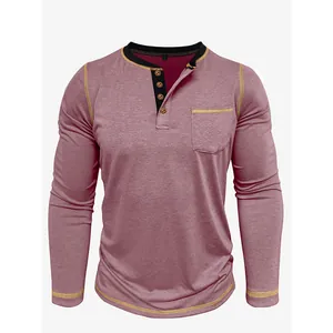 Detail of mauve men's long-sleeve Henley shirt with four-button neckline