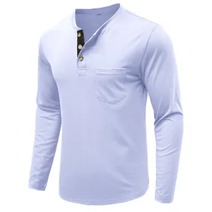 Close-up detail of light blue men's Henley shirt with chest pocket and black placket.