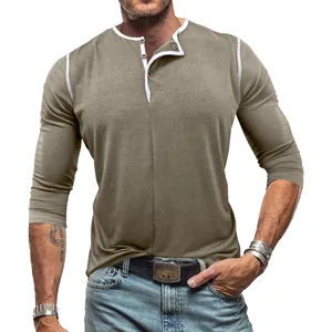 Men's khaki long sleeve Henley shirt with white contrast trim and button neckline.