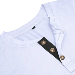 Macro detail of men's breathable light blue Henley shirt collar showing buttons and size label