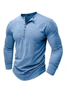 Close-up detail of blue slub cotton men's Henley shirt featuring a seven-button placket