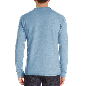 Back view of men's slim fit light blue long sleeve t-shirt in breathable textured cotton