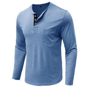 Close-up of a blue Henley collar and chest pocket on a men's long-sleeve slim fit t-shirt.