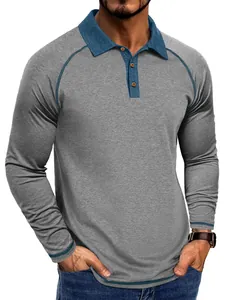 Détail d'un polo à manches longues pour homme gris avec un col et une patte boutonnée bleus.