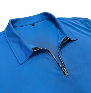 Close-up detail of a blue men's polo shirt featuring a quarter-zip collar and mesh texture