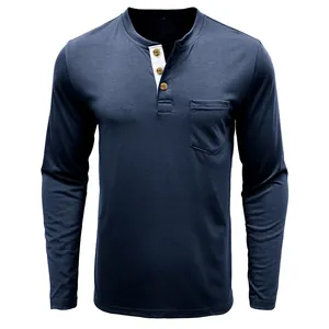Men's navy blue long-sleeved Henley T-shirt with chest pocket and white button placket detail